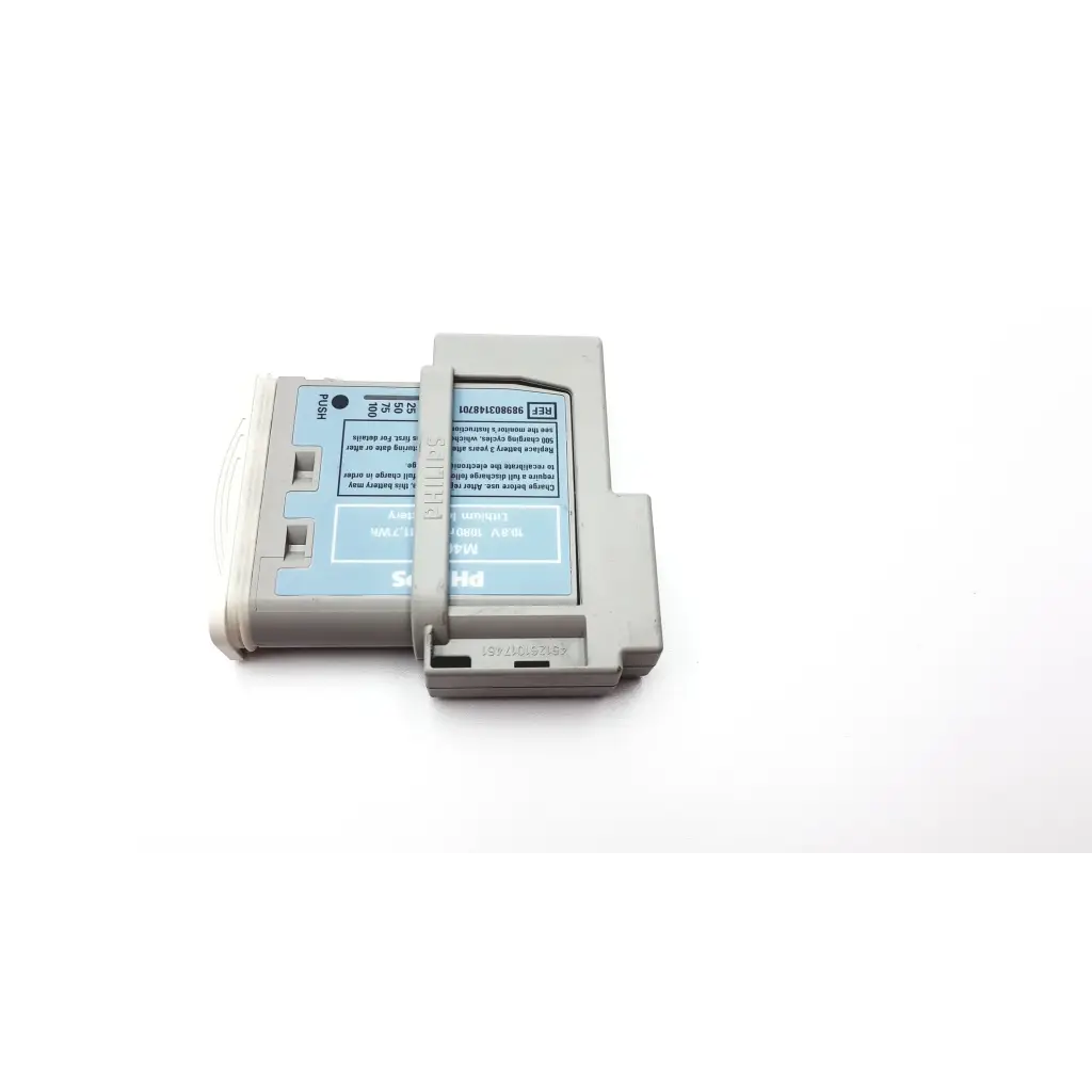 Gray plastic philips intellivue m4607a mp2 battery module with light blue label and white text for patient monitor