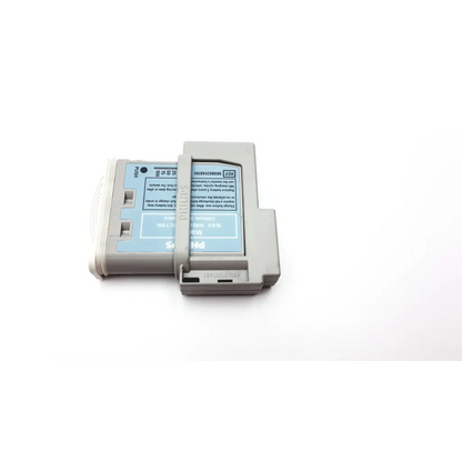 Gray plastic philips intellivue m4607a mp2 battery module with light blue label and white text for patient monitor
