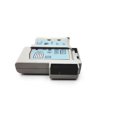 Gray plastic philips intellivue m4607a mp2 battery module with black component and blue label featuring barcode and symbols