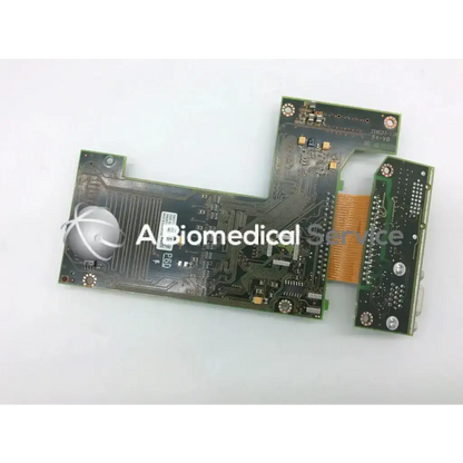 Green circuit board of philips intellivue mp70 with silver soldered components and white circular heat sink m8071-67011