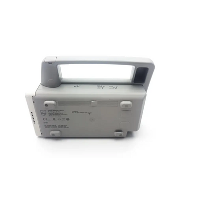Gray plastic philips heartstart fr30 defibrillator with handle and ventilation slots for monitor ecg spo2 nibp use