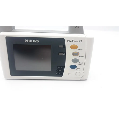 White Philips Intellivue X2 monitor ECG spo2 NIBP temp with black screen and color-coded buttons for vital signs monitoring