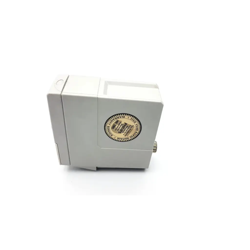 White rectangular philips m1002b ecg respiratory module with circular gold label and small metallic side knob
