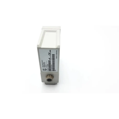 White rectangular philips m1002b ecg respiratory module with metallic adjustment knob and printed specifications on its side