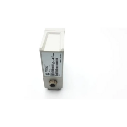 White rectangular philips m1002b ecg respiratory module with metallic threaded port and labeled specifications close-up
