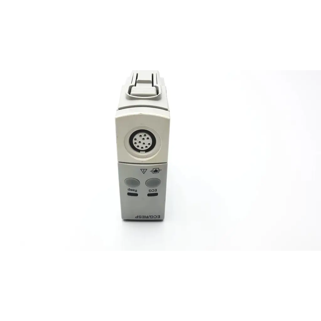Gray philips m1002b ecg respiratory module showing circular port and two labeled buttons on the back side