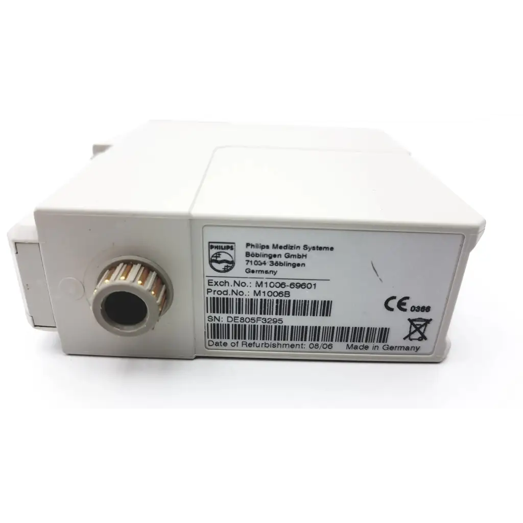 White plastic philips m1006b invasive blood pressure measurement module with circular metallic connector and printed specs