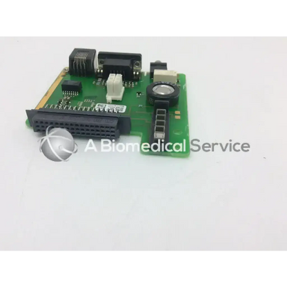 Green circuit board with black connectors and components of philips m3046-66422 connector io board