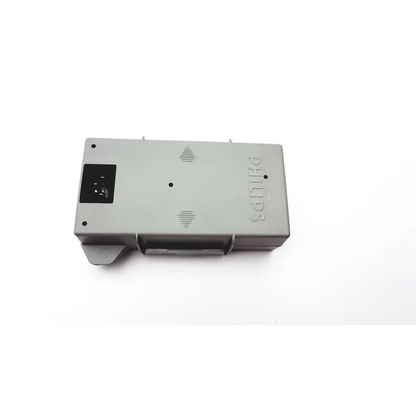 Gray plastic philips m3539a heartstart mrx power adapter with black input port and ventilation grooves shown from the back side