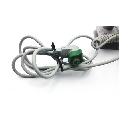 Gray coiled power cord with green and gray connector secured by black zip tie for philips m3543a water resistant paddles
