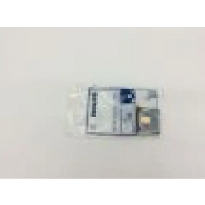A compact philips m3854a data card with silver metallic casing and visible circuitry for electronic data use