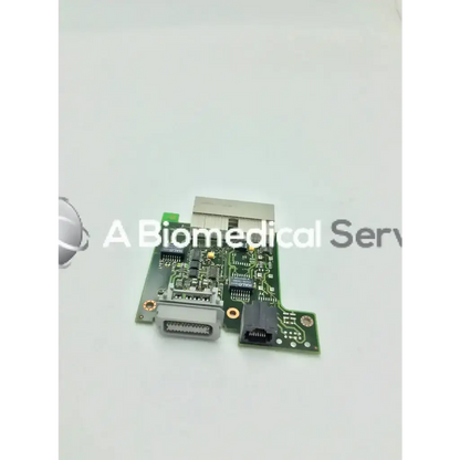 Green philips m8080-26401 intellivue mp60 circuit board with silver connectors and black plastic housing