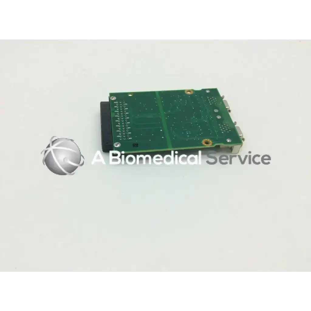 Green rectangular philips m8086-67021 monitor remote interface circuit board card with gold screw holes and edge connectors