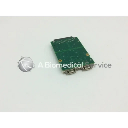 Philips m8086-67021 green circuit board with two silver db9 connectors and gold screws for monitor remote interface circuit