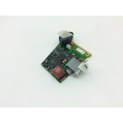 Green printed circuit board with black and red components and gray ribbon connector for philips mp60 defib m8085-67001 pcb