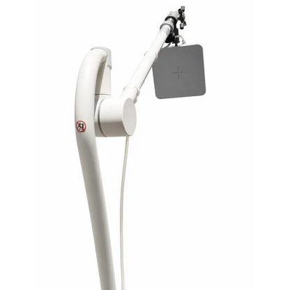 White articulated arm medical light with gray square head and central cross mark on philips percunav planar field generator stand