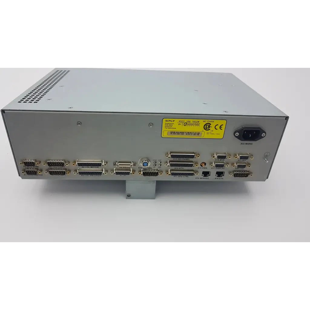 Silver metallic philips prodrive 6159-0700-0105 industrial control unit with d-sub connectors and yellow warning label back side