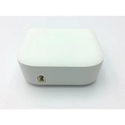 White rectangular philips respironics dreamstation overnight battery pack with rounded edges and circular side port