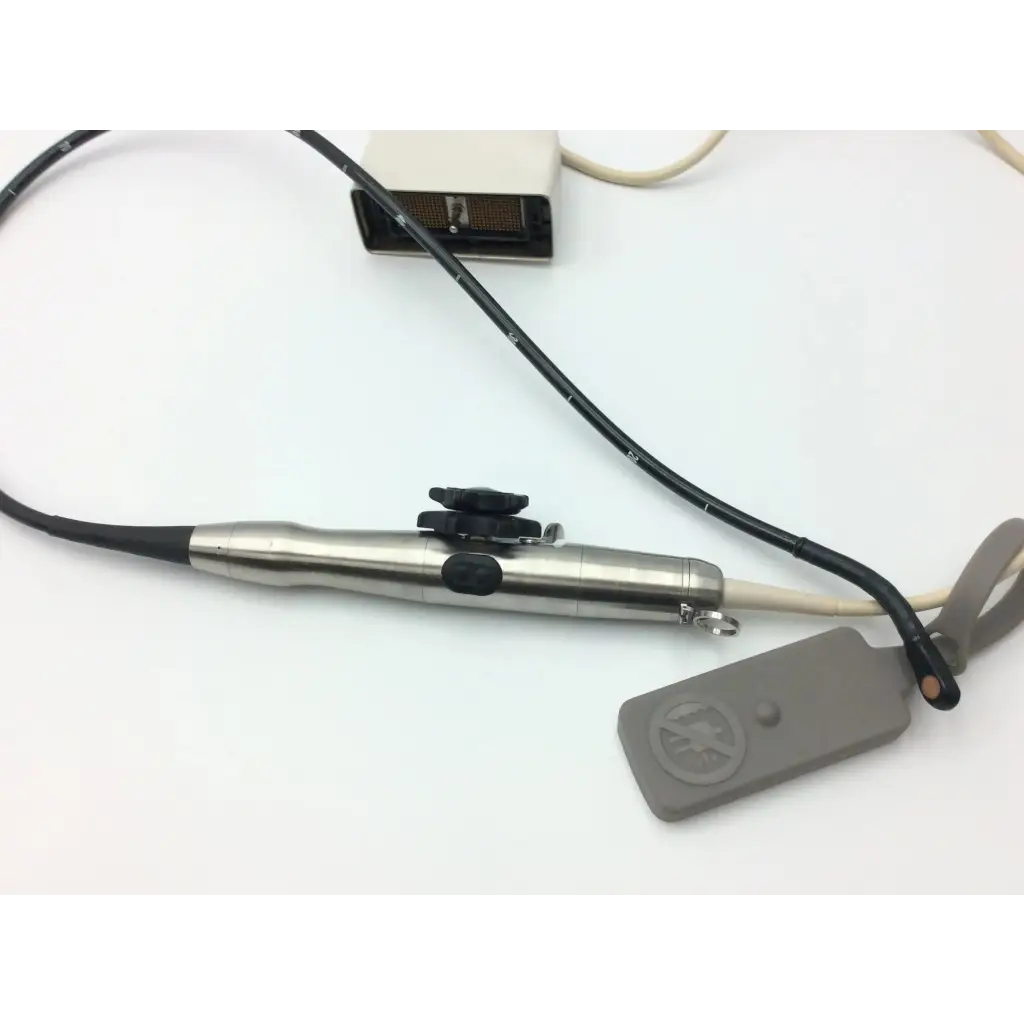Silver metallic philips s7-2t omni tee transducer with black rubber grip and control buttons connected to flexible cable