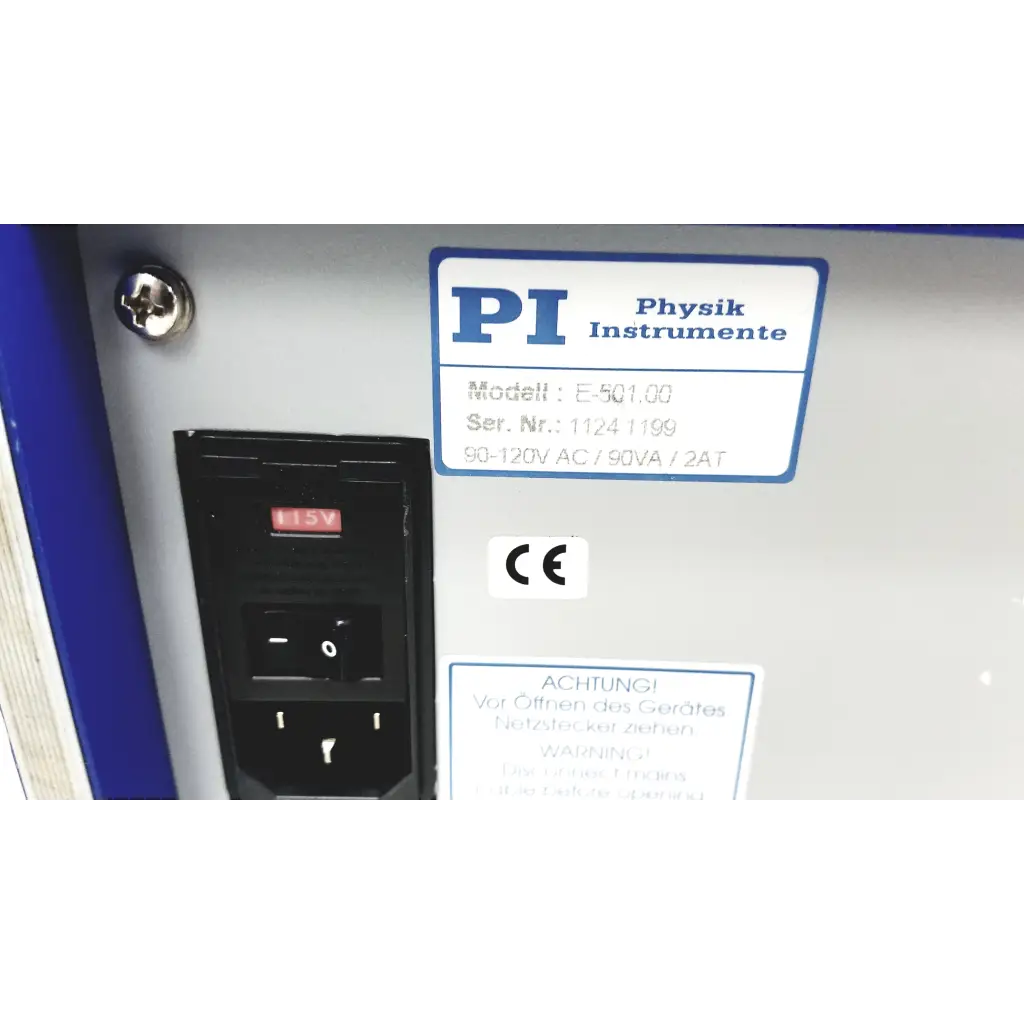 Gray and blue physik instrumente e-501 3 channel servo controller lvpzt amplifier with black panel and red led indicator