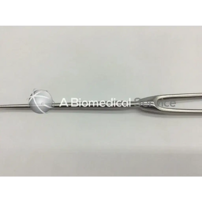 Silver cushing vein retractor with a spherical textured handle and curved forked tip for vein retraction