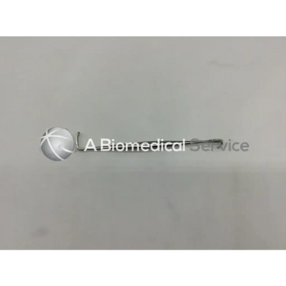 Silver senn retractor surgical instrument with spherical cross-hatched head and curved slender metallic handle