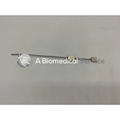 Silver stamey needle 9 3/4 inch angled 15 deg with rounded tip and two metal caps on shaft deg ac5-294 121322sm