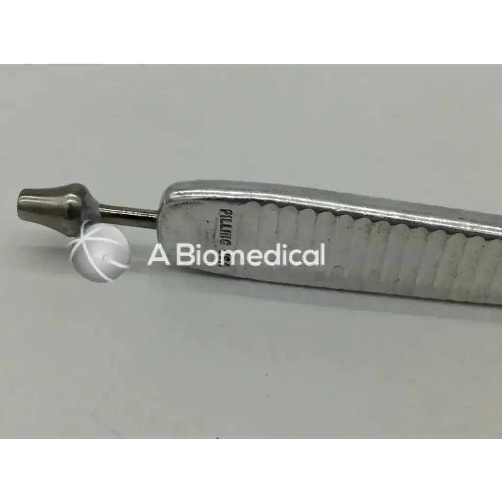 Silver dental spatula retractor 10mm with textured grip and engraved filling marking for precise use