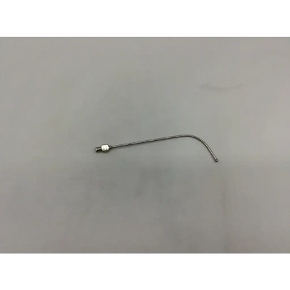 Silver-colored slender metal abraham laryngeal syringe cannula with curved tip and luer lock threaded end