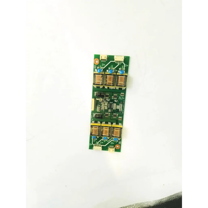 Green rectangular pis corp at-6150 rev a inverter circuit board with gold heat sinks and blue capacitors
