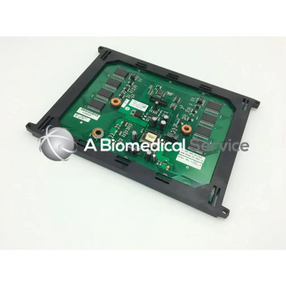 Green circuit board with black components and orange connectors on the back of planar el640.480-am1 lcd screen display panel