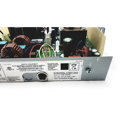 Silver metallic panel with printed labels and specifications on the back of planmeca intra psu2 bbbb2-1 x-ray unit