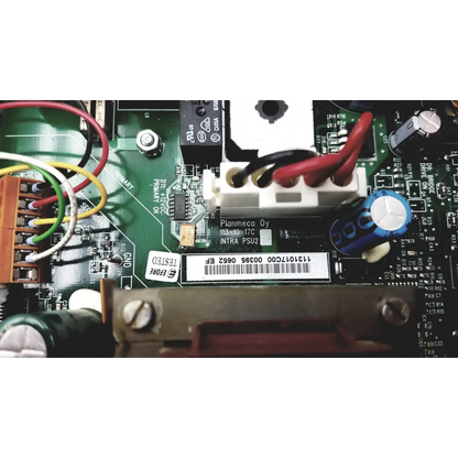 Green circuit board with capacitors and resistors on the back of planmeca intra psu2 bbbb2-1 electronic component