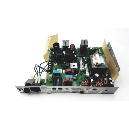 Green circuit board with black capacitors copper windings and silver metal components on metallic chassis for planmeca intra psu2