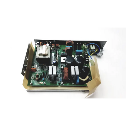 Green circuit board with black capacitors and copper coils mounted on planmeca intra psu2 electronic component