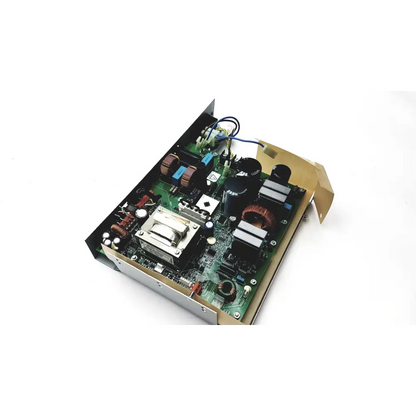 Green circuit board with black and copper capacitors resistors and coils on metallic chassis for planmeca intra psu2