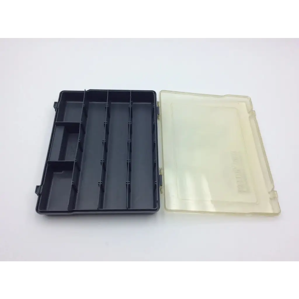 Plano carry away stowaway compartment box is a black plastic organizer with clear lid and multiple compartments