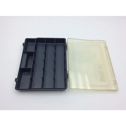 Plano carry away stowaway compartment box is a black plastic organizer with clear lid and multiple compartments