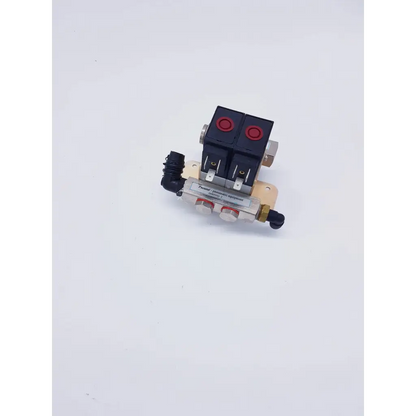 Black and beige dual-actuator pneumatic valve with red caps and metallic fittings from pneutal pneumatic equipment for syneron candela velashape