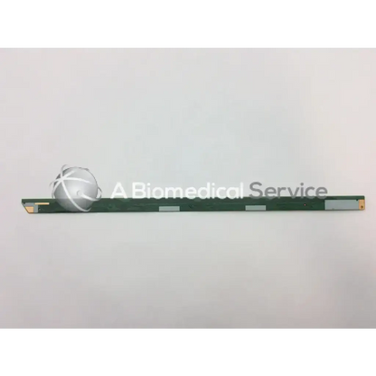 Green rectangular matrix board sharp with silver connectors and small spherical component for polaroid tv system