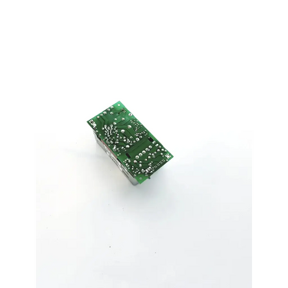 Green rectangular power condor electronic circuit board with silver components and visible traces for supply 15vdc input
