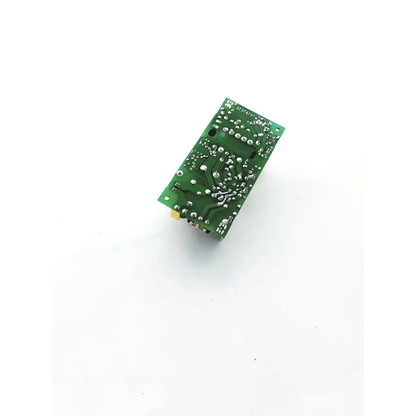 Green rectangular circuit board with silver soldered components and yellow connector in power condor power supply 15vdc