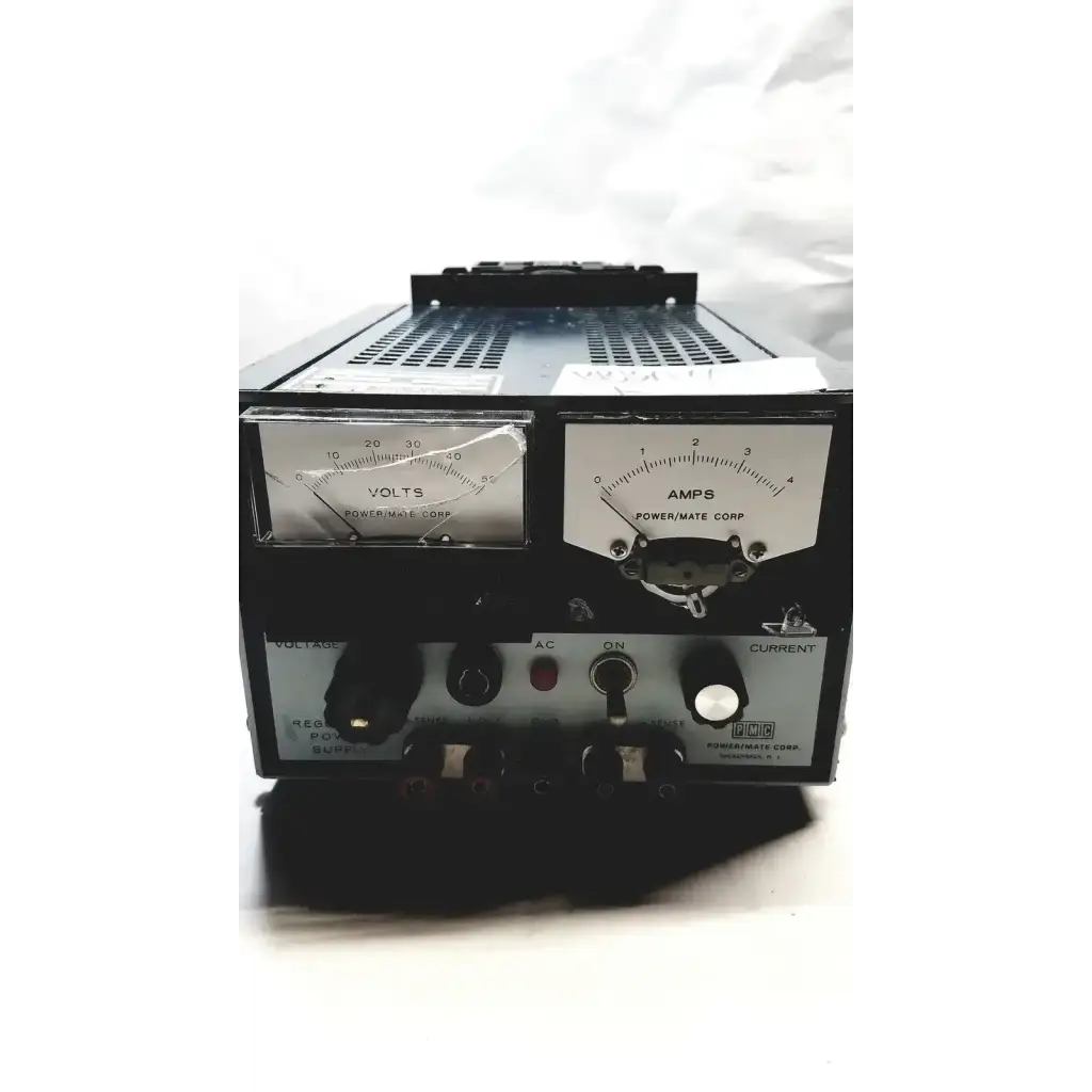 Black power mate corp power supply 105-125v with silver analog voltmeter and ammeter dials for precise monitoring