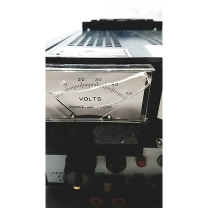 Black power mate corp voltmeter with cracked glass and white dial for 105-125v power supply 47-20hz measurement