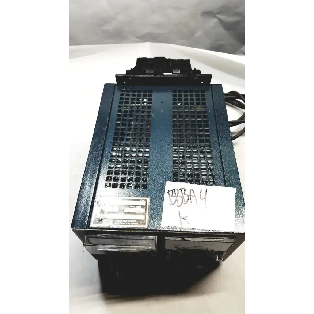 Dark blue metal power mate corp power supply 105-125v with grid vent and handwritten bba 4 label on side