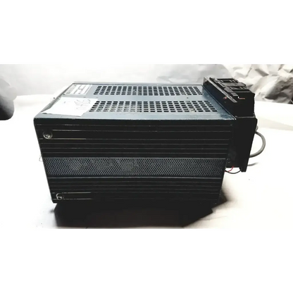 Black rectangular power supply with perforated metal casing and wiring for power mate corp 105-125v 47-20hz