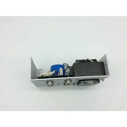 Silver metal electrical enclosure of power-one hd5-12 power supply 7224dkrmb19pr3 with blue capacitor and black transformer