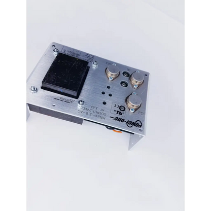 Silver aluminum power supply unit power one hn24-3 with black component and three gold knobs for nibp assembly board