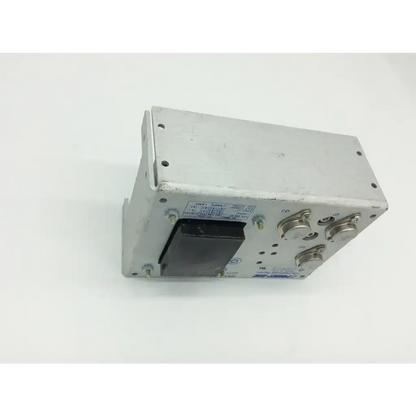 Silver metallic power-one hn24-3.6-ag linear power supply with three adjustment knobs and black side component