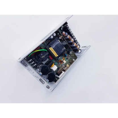 White metal power supply 80w with black yellow capacitors green wiring and silver heat sinks for spacelabs mpc860 cpu
